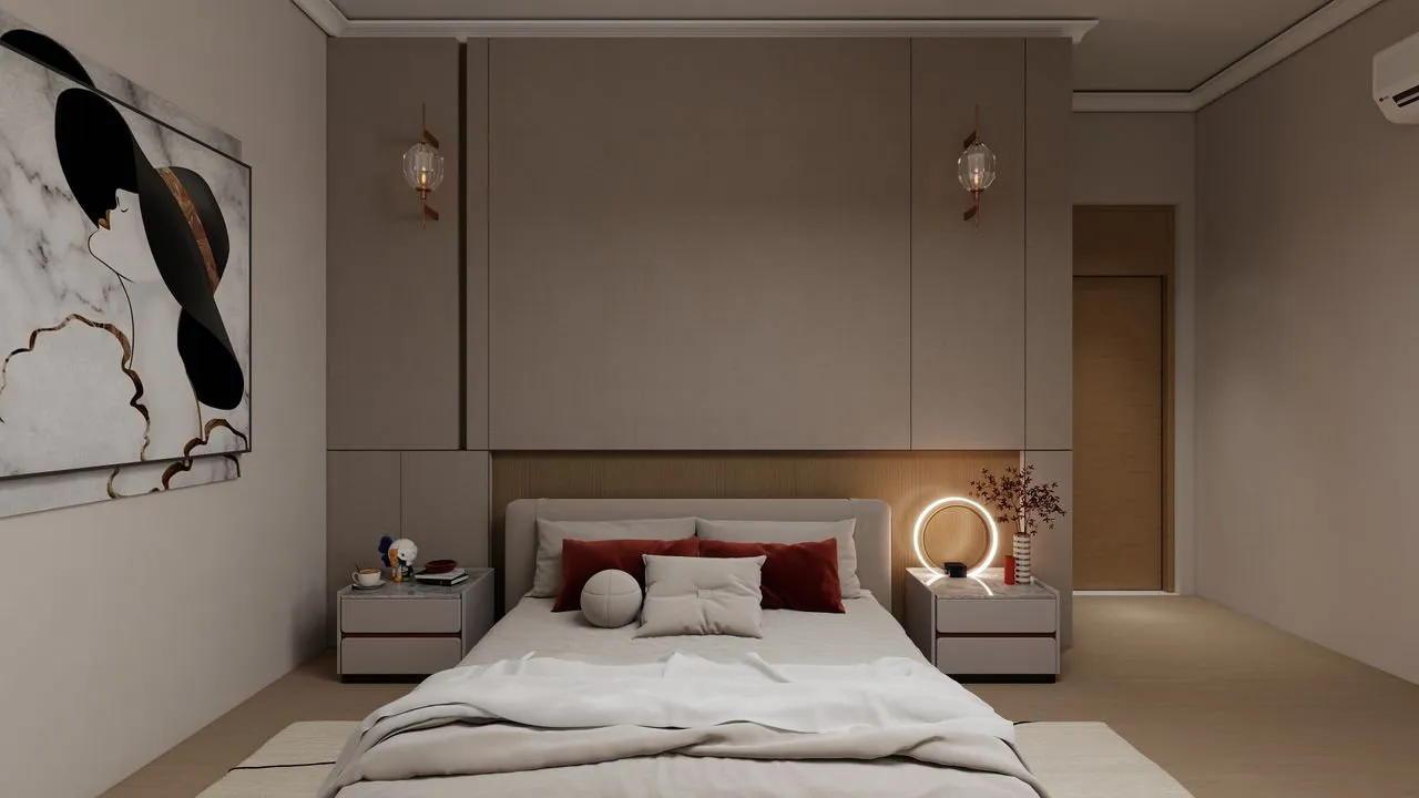Quiet bedroom viewed toward its softly lit headboard