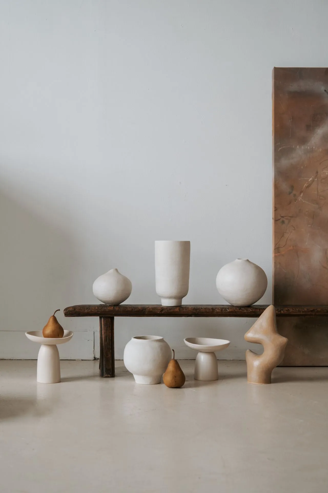 Ceramics arranged as a quiet domestic collection