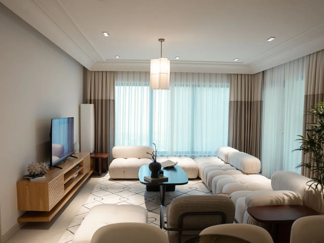 Quiet sitting room connected to the family spaces